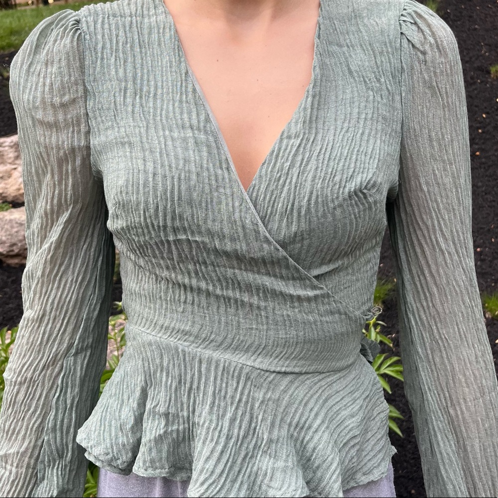 Green long-sleeve blouse